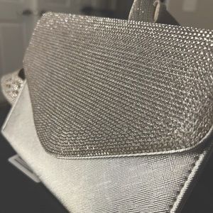 NWT Clutch David’s Bridal super classy . Can be used with or without the chain.